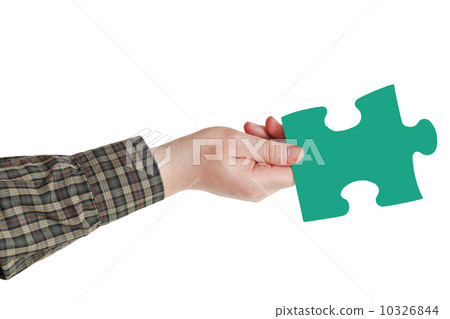 male hand with green puzzle piece male hand with green puzzle piece 10326844