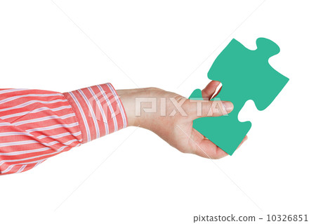 male hand with green puzzle piece male hand with green puzzle piece 10326851
