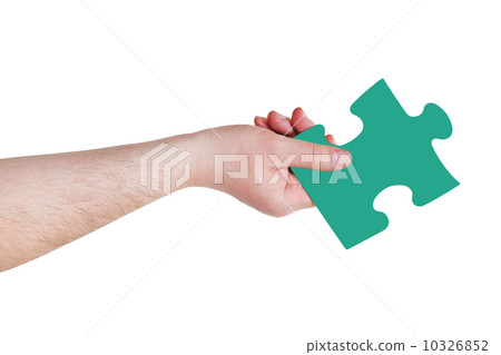 male hand with green puzzle piece male hand with green puzzle piece 10326852