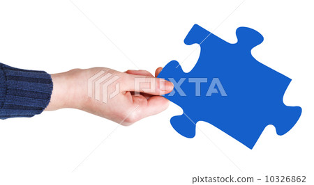 female hand with blue puzzle piece female hand with blue puzzle piece 10326862