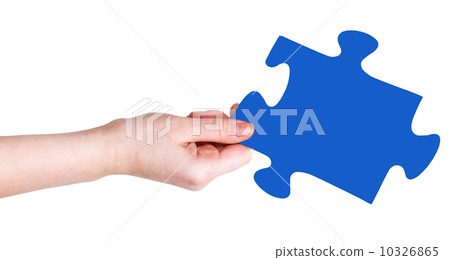 female hand with blue puzzle piece 10326865