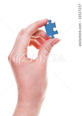 female arm with jigsaw puzzle piece female arm with jigsaw puzzle piece 10327237