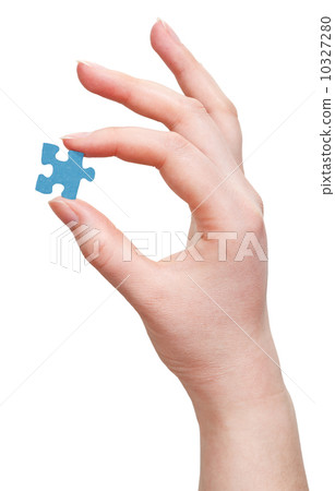 female arm with puzzle piece 10327280