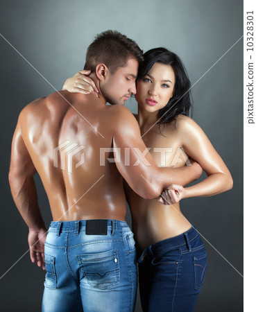 Sexy young married couple posing at camera Sexy young married couple posing at camera 10328301
