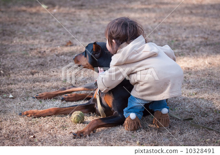 Doberman and a girl 10328491