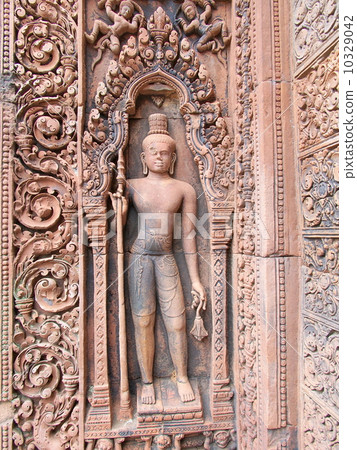 Angkor monument Banteay-Srei Dvarapara statue Angkor monument Banteay-Srei Dvarapara statue 10329042