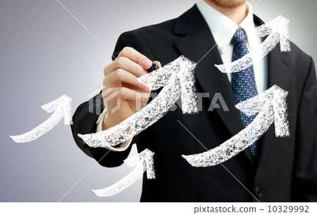 Businessman writing an arrow 10329992