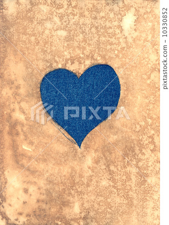 Jeans heart under the aged paper Jeans heart under the aged paper 10330852