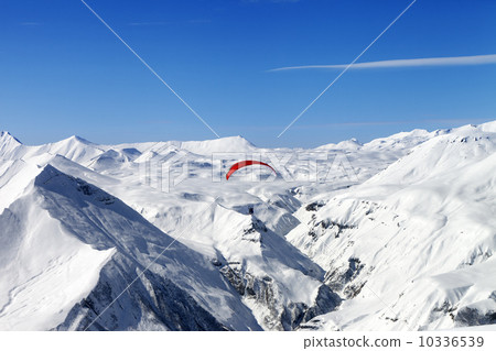 Sky gliding in Caucasus Mountains 10336539