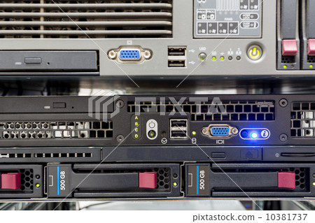 servers stack with hard drives in a datacenter 10381737