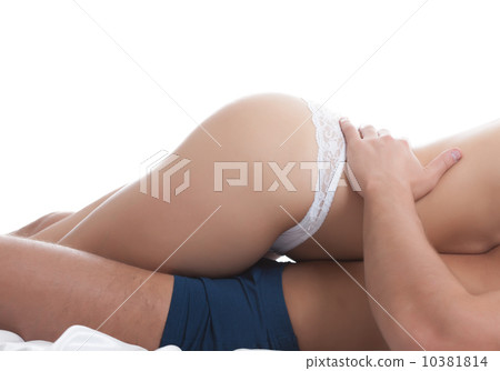 Contact of male and female hips, close-up 10381814
