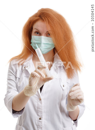Doctor woman or nurse female holds a medical syringe, healthcare 10384145