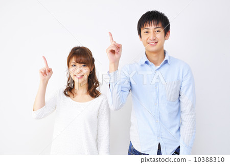 A couple standing forefingers 10388310