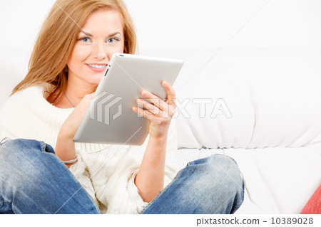 Smiling woman with tablet Smiling woman with tablet 10389028