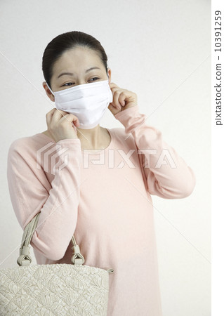 Masked female middle age Masked female middle age 10391259