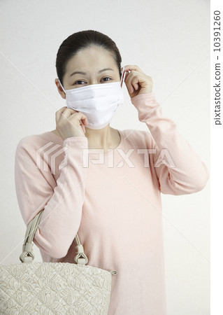 Masked female middle age Masked female middle age 10391260