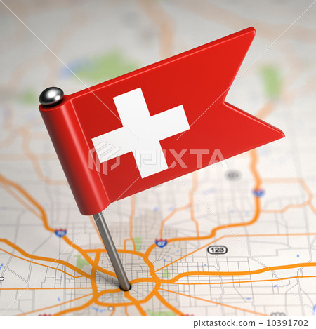 Switzerland Small Flag on a Map Background. Switzerland Small Flag on a Map Background. 10391702