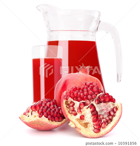 Pomegranate fruit juice in glass pitcher Pomegranate fruit juice in glass pitcher 10391856
