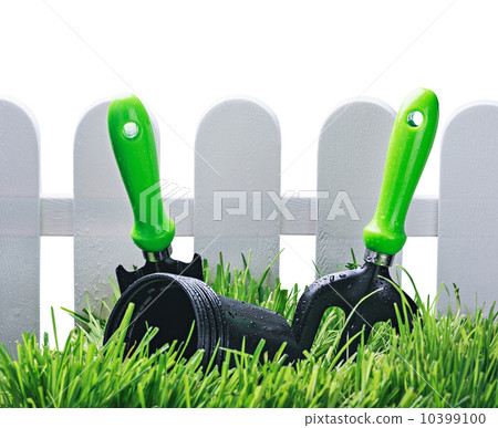 garden tools near the fence isolated garden tools near the fence isolated 10399100
