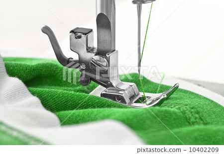 Sewing machine and item of clothing Sewing machine and item of clothing 10402209