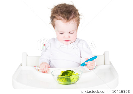 Little baby eating broccoli, isolated on white Little baby eating broccoli, isolated on white 10416598