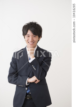 A young businessman wearing a suit 10418285