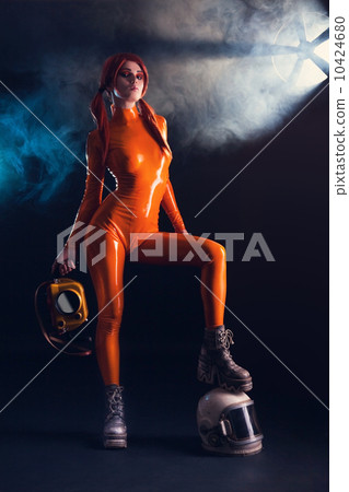 Sexy girl in orange latex catsuit with helmet,... - Stock Photo [10424680]  - PIXTA
