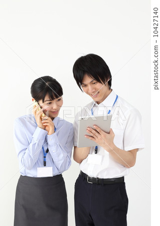 Employees using tablets and smartphones (Cool Biz) Employees using tablets and smartphones (Cool Biz) 10427140