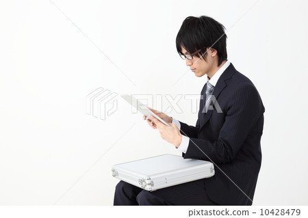 Worker working on tablet Worker working on tablet 10428479