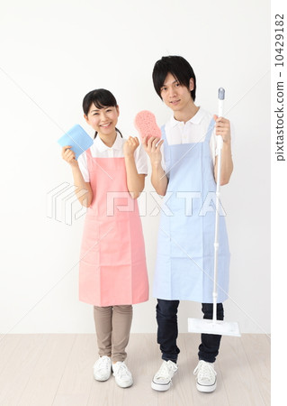 Men and women with cleaning tools 10429182