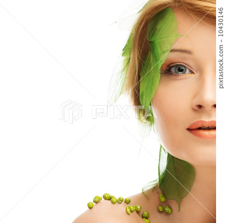 Beautiful young woman in conceptual spring costume 10430146