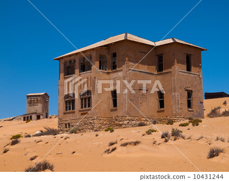 Sand in abandoned house in Kolmanskop ghost town Sand in abandoned house in Kolmanskop ghost town 10431244