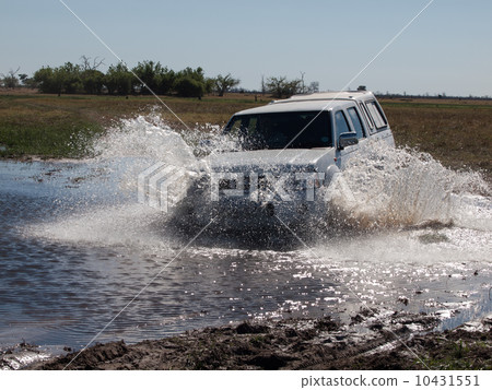 Car passing the ford 10431551