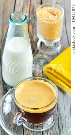 Cup of coffee with brown sugar and milk Cup of coffee with brown sugar and milk 10433979