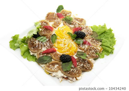 fruit salad with figs on a white background in the restaurant 10434240