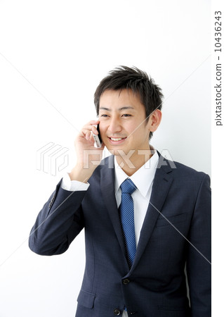 A businessman talking on a smartphone 10436243