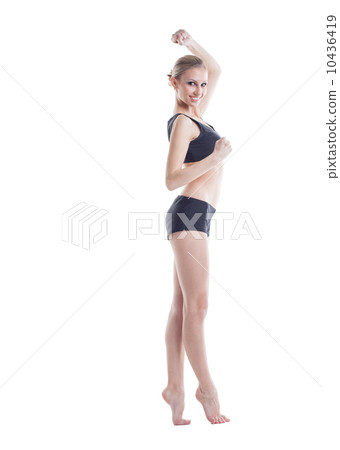 Cheerful slim girl posing looking at camera Cheerful slim girl posing looking at camera 10436419