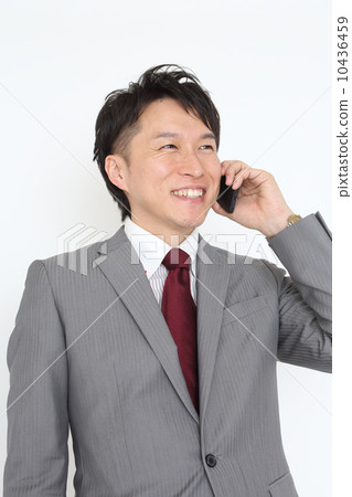 商人談移動電話 10436459