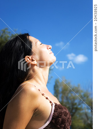 Attractive young girl relaxes Attractive young girl relaxes 10438925