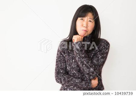 A woman who is worried A woman who is worried 10439739