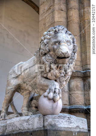 Sculpture of Lion with ball at the Loggia of Lanzi. Florence, Italy 10442157