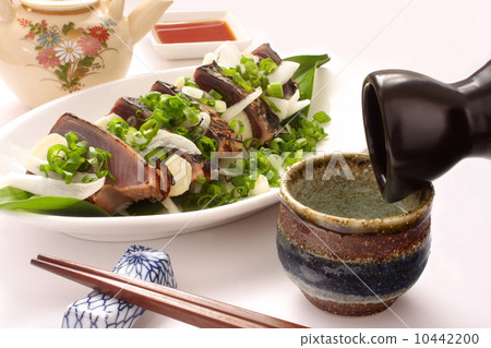 Snack of bonito Japanese sake Japanese dinner breeze white background 10442200