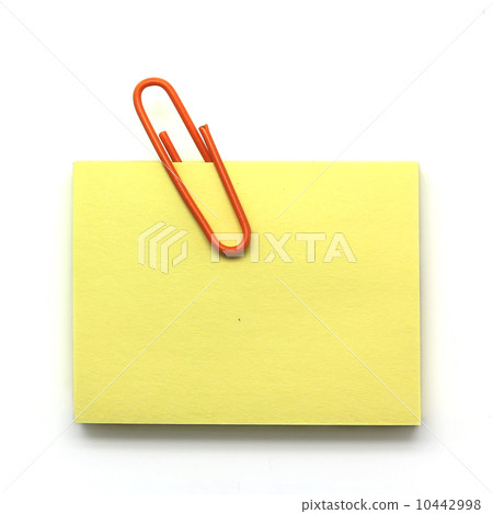 Paper clip and notepad isolated on white 10442998