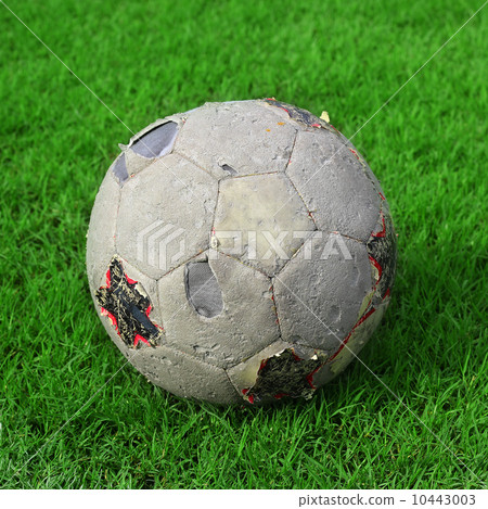 old soccer ball on soccer field old soccer ball on soccer field 10443003