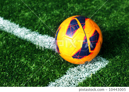 old soccer ball on soccer field old soccer ball on soccer field 10443005