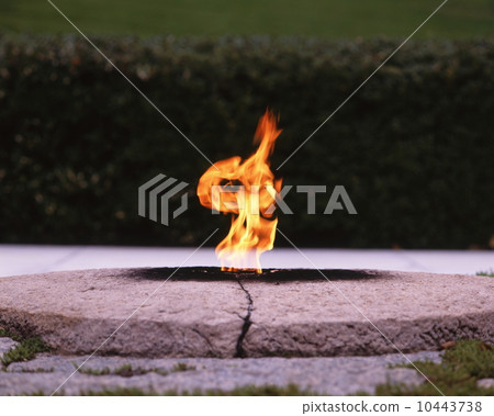 The eternal flame of the tomb of John F. Kennedy 10443738