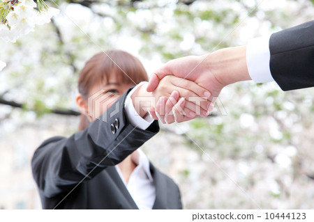A woman shaking hands A woman shaking hands 10444123