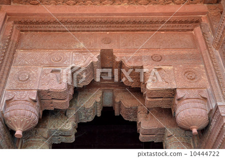 Inside of Jahangir Palace in Argella with red sandstone which looks like wooden structure 10444722