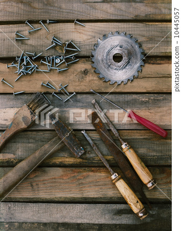 set of tools on a wooden background set of tools on a wooden background 10445057