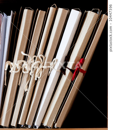 cardboard folders with papers 10447396
